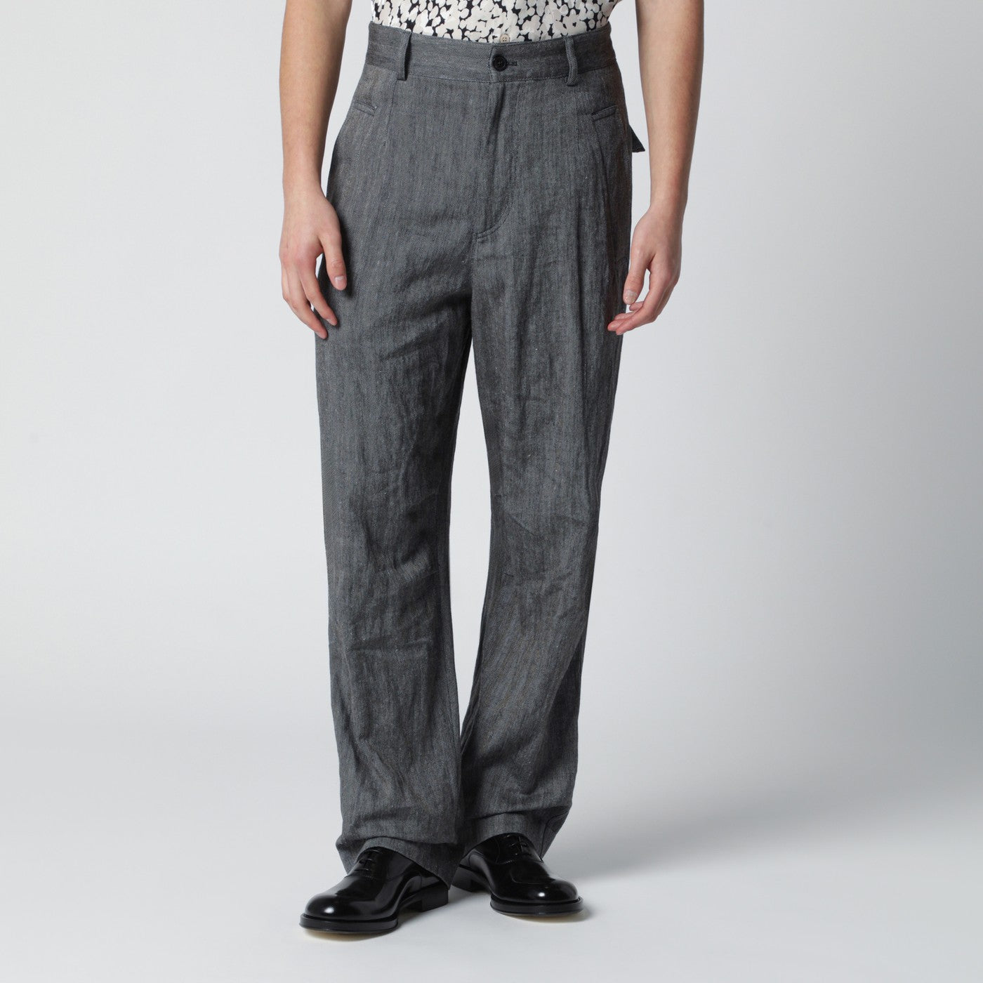 Black herringbone trousers