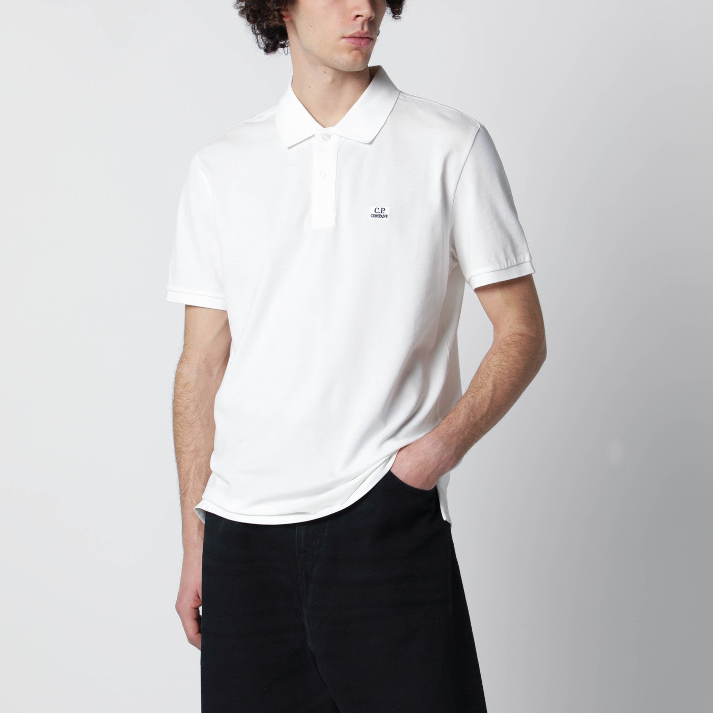 White polo shirt with logo patch White polo shirt with logo patch