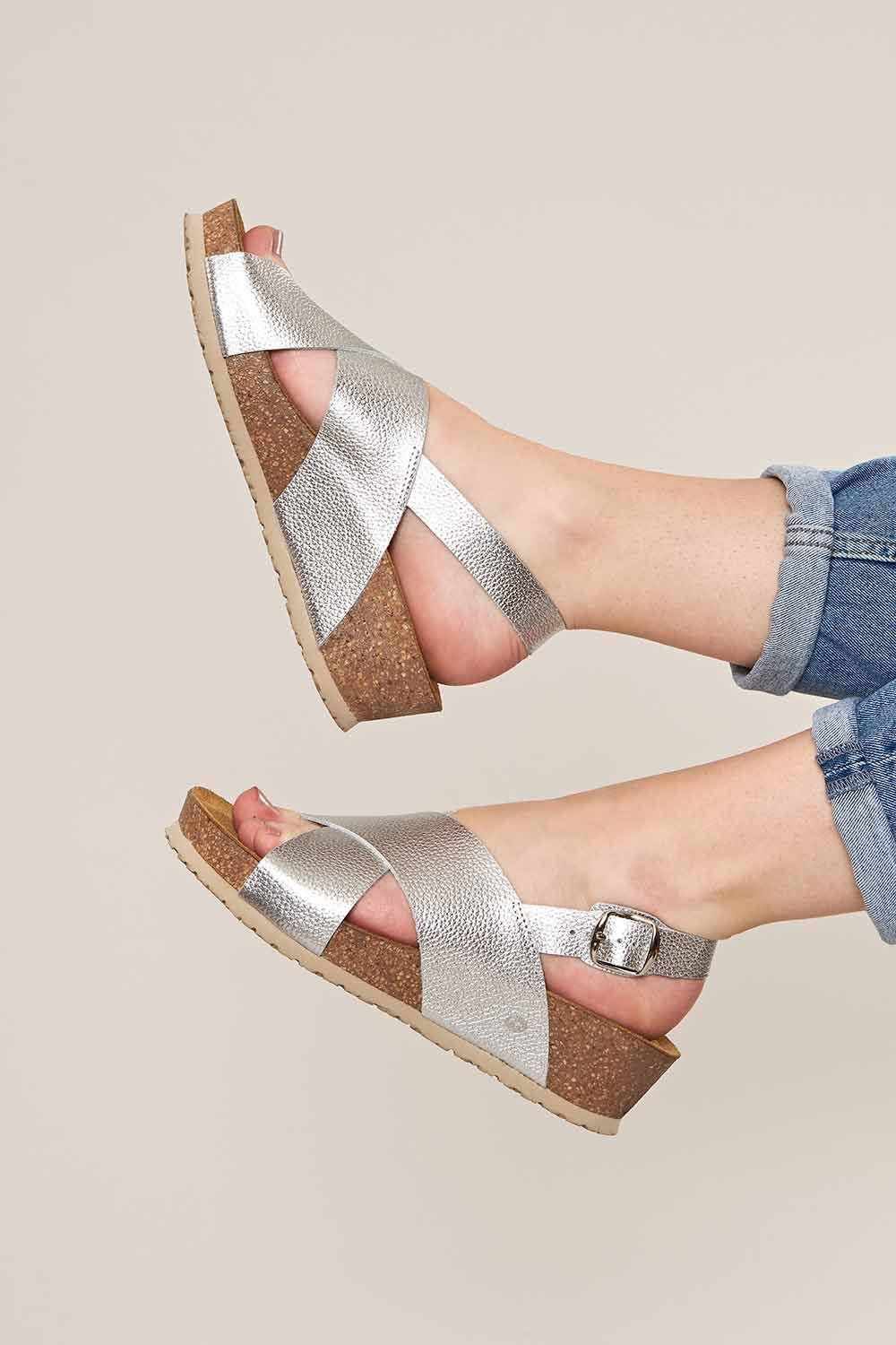 Moshulu ‘harlyn’ Leather Cross-Over Cork Wedge Sandals In Metallic Silver Moshulu ‘harlyn’ Leather Cross-Over Cork Wedge Sandals In Metallic Silver