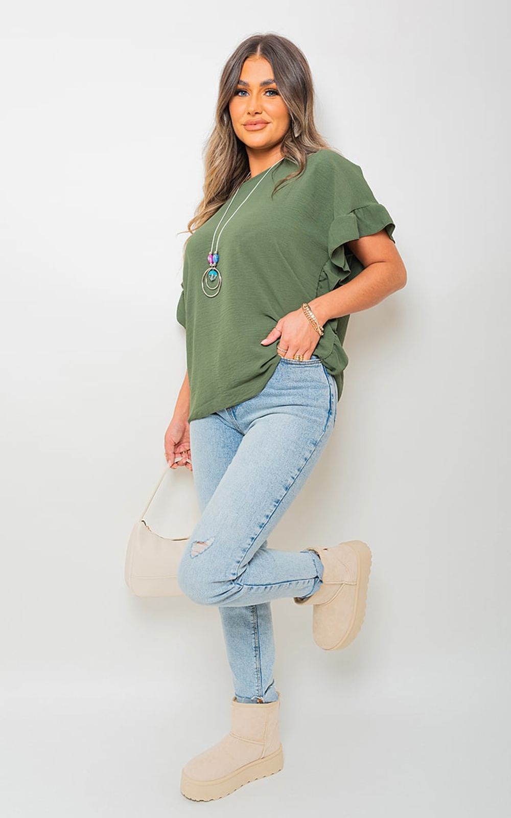 Diana V-Neck Button-Down Cardigan: Timeless Charm, Cozy Comfort, Versatile Style for Any Occasion – ML Beige Diana V-Neck Button-Down Cardigan: Timeless Charm, Cozy Comfort, Versatile Style for Any Occasion – ML Beige